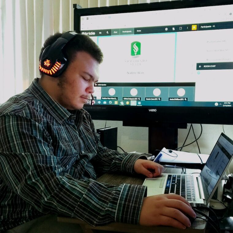 Student working with his laptop
